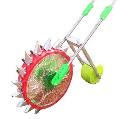 qualidade  Farm machinery hand push vegetable seeder machine seed planter peanut bean onion seed planter small fábrica